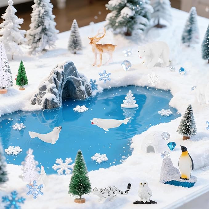 56 Pcs Arctic Animals Figurines Set Includes 14 Polar Animals Figurines 10 Pine Trees 4 Artificial Lceberg Fake Snow 3 Packs Fake Ice Rocks Fake Snow Blanket 2 Blue Tissue Paper Arctic Diorama Kit