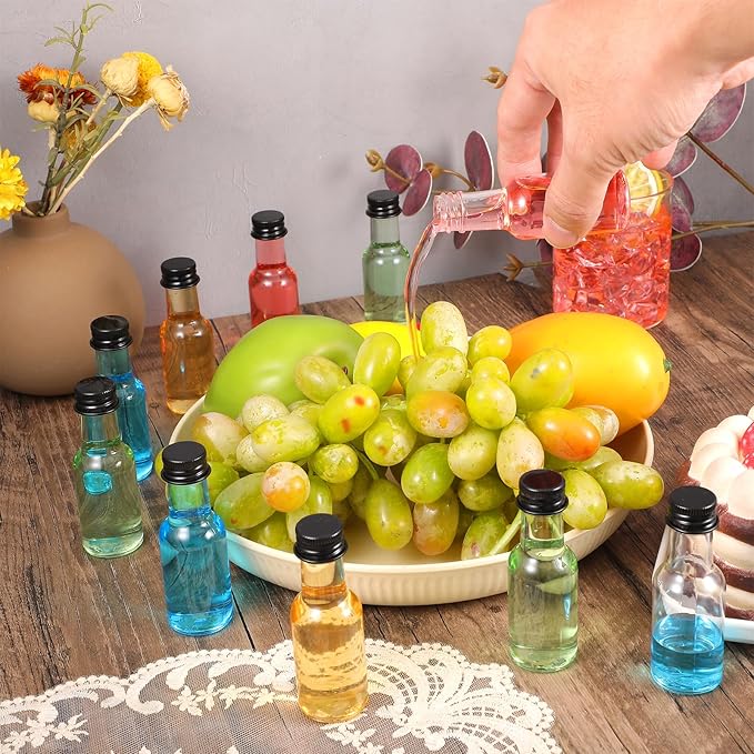100 Pcs Mini Liquor Bottles Plastic Mini Salad Dressing Bottle Christmas Small Shooter Alcohol Holders with Cap Wine Hot Sauce(0.8 Oz,Black)