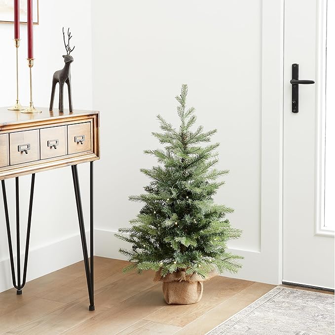 National Tree Company 3 ft Pre-Lit Nordic Spruce Mini Artificial Christmas Tree, Burlap Base, Red Bow, 50 Clear LED Lights, 363 Tips, Timer, Green